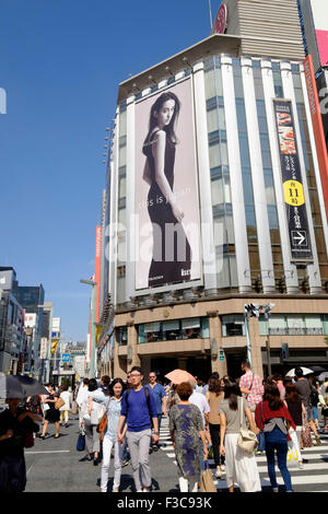 Busy street in upmarket shopping district of Ginza in Tokyo Japan Stock Photo