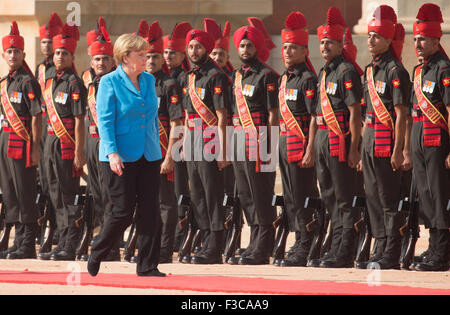 New Delhi, India. 05th Oct, 2015. German Chancellor Angela Merkel is received with military honours upon her arrival in New Delhi, India, 05 October 2015.  Modi are scheduled to lead the third inter-governmental consultations. Photo: Kay Nietfeld/dpa/Alamy Live News Stock Photo