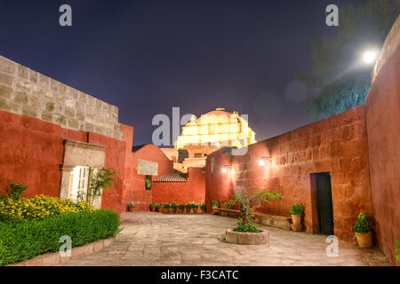 Nighttime view of a courtyard in the historic Santa Catalina Monastery in Arequipa, Peru Stock Photo