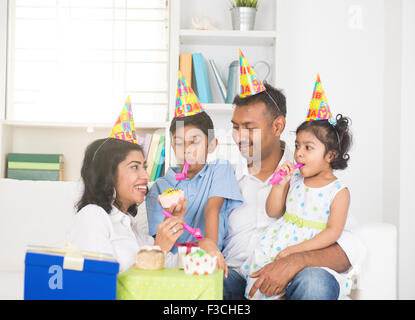 indian family birthday celebration with son and daughter Stock Photo