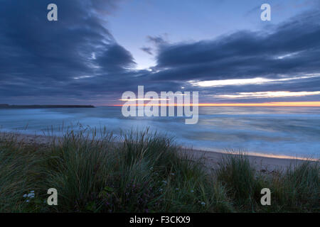 Dunes and beach at Beadnell bay. Northumberland coastal sunrise Stock Photo