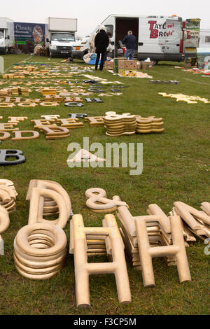 UK, England, Lincolnshire, Lincoln, Antiques Fair, old gilded letters from pub names displayed on ground Stock Photo