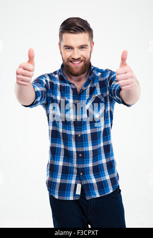 Portrait of a smiling man showing thumbs up isolated on a white background Stock Photo