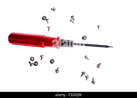 isolated shot of red handle screwdriver and  screws Stock Photo