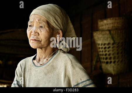 Old woman of the Loi tribe inside her house in Wun Nyat, a village close to China border, Shan State, Myanmar