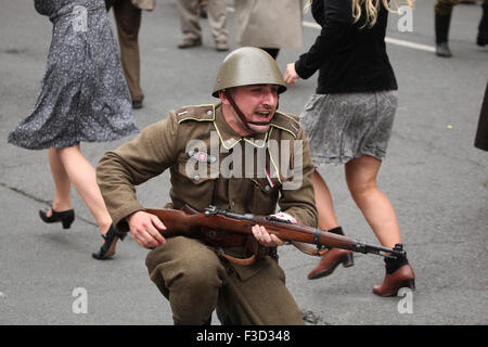 A reenactor dressed as a Czech insurgent attends the reenactment of the 1945 Prague uprising in Prague, Czech Republic, on May 9, 2015. Stock Photo