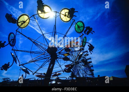 Giant wheel and Umbrella ride at Skegness Pleasure Beach. Lincolnshire. England. UK Stock Photo