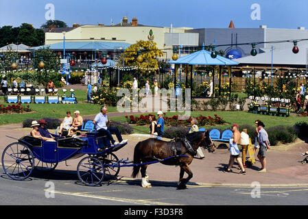 Horse and carriage ride along Skegness promenade. Lincolnshire. England. UK Stock Photo