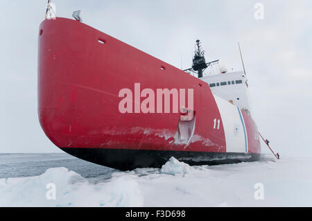Scientists climb the ladder to the Polar Sea icebreaker while working in the Arctic Ocean. Stock Photo