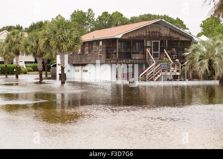 Charleston, South Carolina, USA. 05th Oct, 2015. A home surrounded by floodwater in the quaint beach community of Sullivan's Island as freak rain storms drenched the region with more than 28-inches of rain over the past three days October 5, 2015 in Charleston, South Carolina. Credit:  Planetpix/Alamy Live News Stock Photo