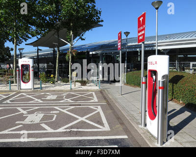 Electric Car Charging Point at South Mimms Motorway Services on the M25 for Tesla Cars Stock Photo