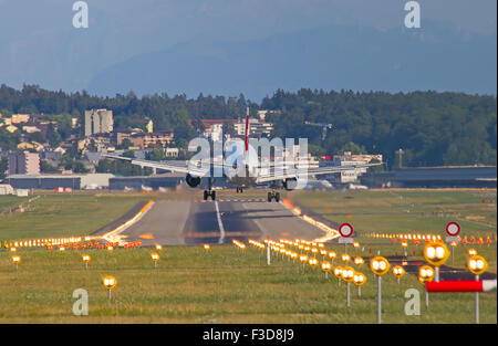 ZURICH - JULY 18: Airbus A-319 Swiss Air landing in Zurich after short haul flight on July 18, 2015 in Zurich, Switzerland. Zuri Stock Photo