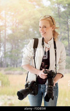 Portrait of female photographer Stock Photo