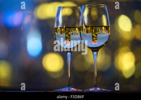 Two wineglasses with white wine Stock Photo