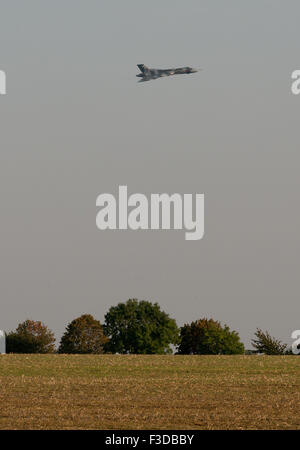 Shuttleworth, Beds, UK. 4th October, 2015. Avro Vulcan bomber last air display in flight at the Air Display on Oct 4, 2015 at Shuttleworth, Old Warden Park, Bedfordshire, UK. Credit:  Tim Walton/Alamy Live News Stock Photo