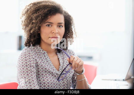 Young woman working at office Stock Photo