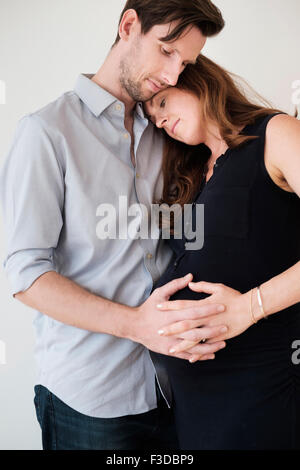 Portrait of content couple holding hands Stock Photo