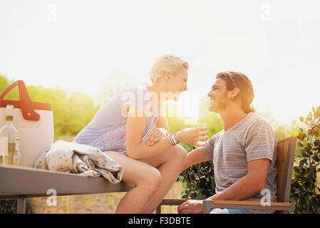 Couple laughing on rooftop