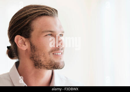 Mid-adult man looking away Stock Photo