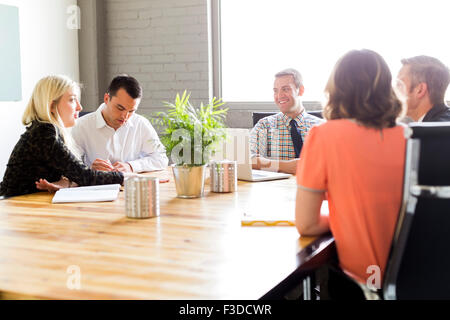 Five office workers during meeting Stock Photo