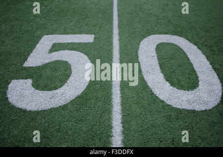 Football field marking of 50 yard line Stock Photo