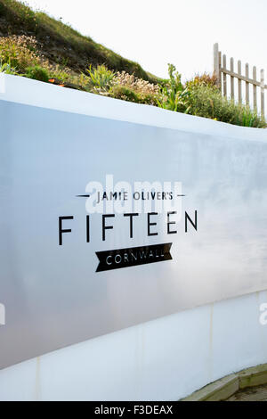 Sign at the entrance to Jamie Oliver's Fifteen restaurant in Watergate Bay, Cornwall. Stock Photo