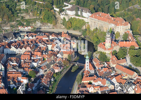 AERIAL VIEW. Medieval castle overlooking the old town and the Vltava River. Ceský Krumlov, Bohemia, Czech Republic. Stock Photo