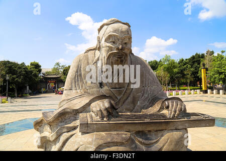 Statue of a Chinese musician in Yunnan Stock Photo