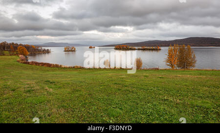 Narsjoen lake with several small islands in autumn, Hedmark county,  Norway Stock Photo