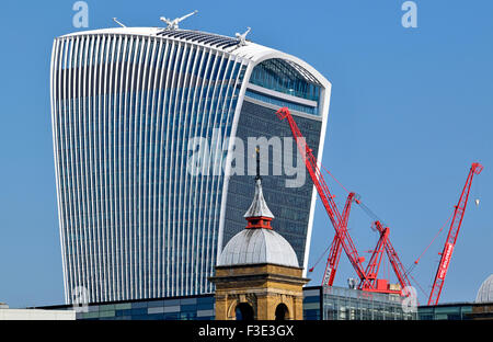 London, England, UK.  'Walkie-Talkie' building (20 Fenchurch Street, Rafael Viñoly: 2014) and red cranes Stock Photo