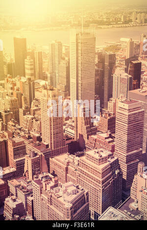 Vintage style picture of Manhattan at sunset, New York, USA. Stock Photo