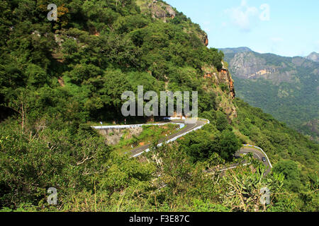 Hilly hairpin bend roads in Kerala Tamilnadu border Stock Photo