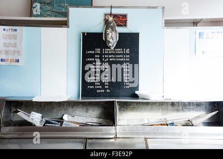 IInterior of typical English fish and chip shop showing three deep fat ...