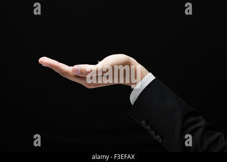 Open palm hand gesture of male Stock Photo