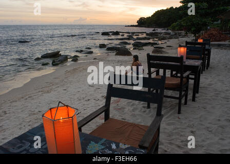 Tables of some of the restaurants on the beach. Sihanoukville beach. Some of these Sihanoukville beaches are crowded with beach Stock Photo