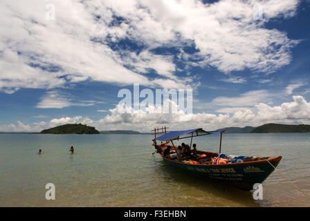 Boat for snorkeling on the island of Koh Russei. Koh Russei or Bamboo Island is one of a group of small islands in the Gulf of T Stock Photo