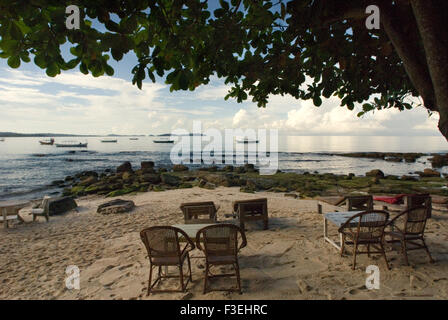 Tables of some of the restaurants on the beach. Sihanoukville beach. Sihanoukville has a different look and feel than most Cambo Stock Photo