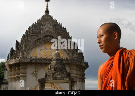 Buddhist Monk at Wat Kandal Battambang. Despite being the second largest city in Cambodia, with a population of over 250,000 and Stock Photo