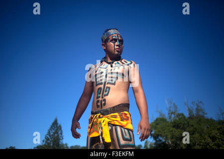 A Mayan Ball Player poses at the first ¨Pok Ta Pok¨ ritual Mayan ball game World Cup in Piste, Tinum, Yucatan, Mexico Stock Photo