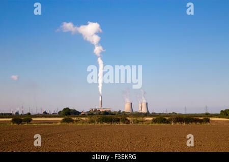 Stock photograph of Cottam power station with steam / smoke emissions rising into the sky from the cooling towers.  West Burton