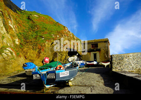 Former Lifeboat Station  & Boats, Polpeor Cove, Lizard Point, Lizard Peninsula, Cornwall, England, UK Stock Photo