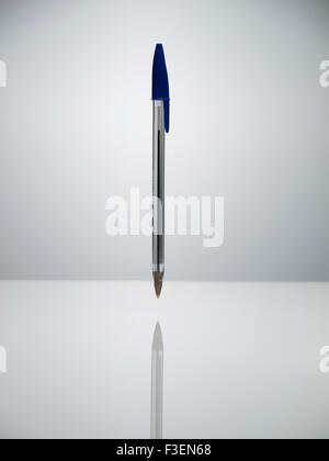 Bic Crystal Blue Pen suspended on white background Stock Photo