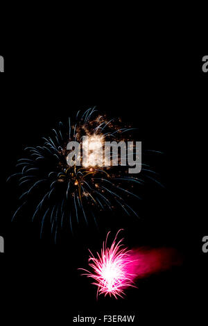 Festive and colorful fireworks against a black background - 3 Stock Photo