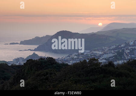 A spectacular sunrise viewed from Torrs Park looking over the North Devon town of Ilfracombe Stock Photo