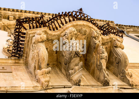 Traditional baroque style balconies in Scicli, Sicily. Stock Photo