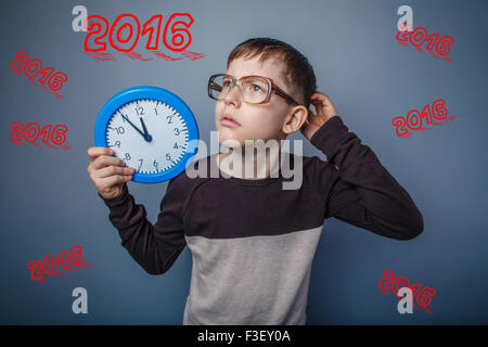 boy teenager European appearance Brown turned his back on a blac Stock Photo