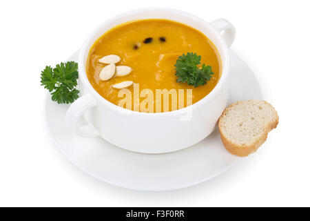 Pumpkin soup with fresh pumpkins in bowl isolated on a white background Stock Photo