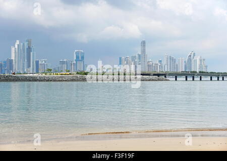 Panama City skyscrapers skyline viewed from a beach of the Pacific coast, Panama, Central America Stock Photo