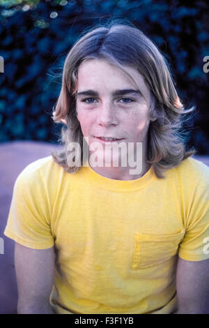 Future Hollywood stuntman Reid Rondell sits for an informal portrait at age 16 after practicing stunts in the backyard of his home in Canoga Park, California, USA. Rondell appeared in a number of movies and television shows before he was killed at age 22 in a helicopter crash in 1985 while working as a stunt double for actor Jan-Michael Vincent in the 'Airwolf' TV series. Doing daring stunts is a Rondell family tradition; Reid's grandfather, father, brother and nephew all have been stuntmen.  Photographed in 1979. Stock Photo