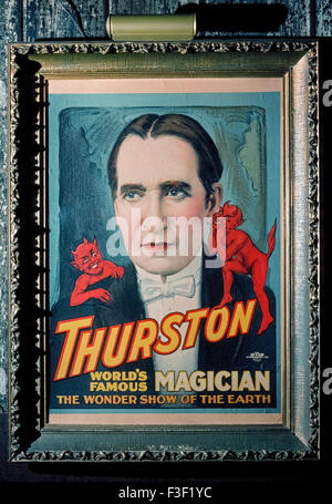 A poster advertising famous magician Thurston is displayed in the Magic Castle, a private nightclub for magicians and magic enthusiasts in Hollywood, California, USA. For 30 years until his death in 1936, Howard Thurston was the star of the biggest and best-known traveling magic show of its time. The Magic Castle is a 1909 mansion open only to those who belong to the Academy of Magical Arts, an organization devoted to the advancement of the art of magic. Academy members and their guests are treated nightly to a number of magic shows as well as dining and drinking at this historic social club. Stock Photo